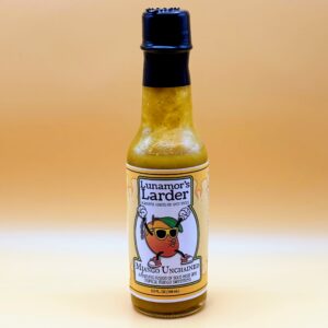 Bottle of Mjango Unchained with Yellow Background